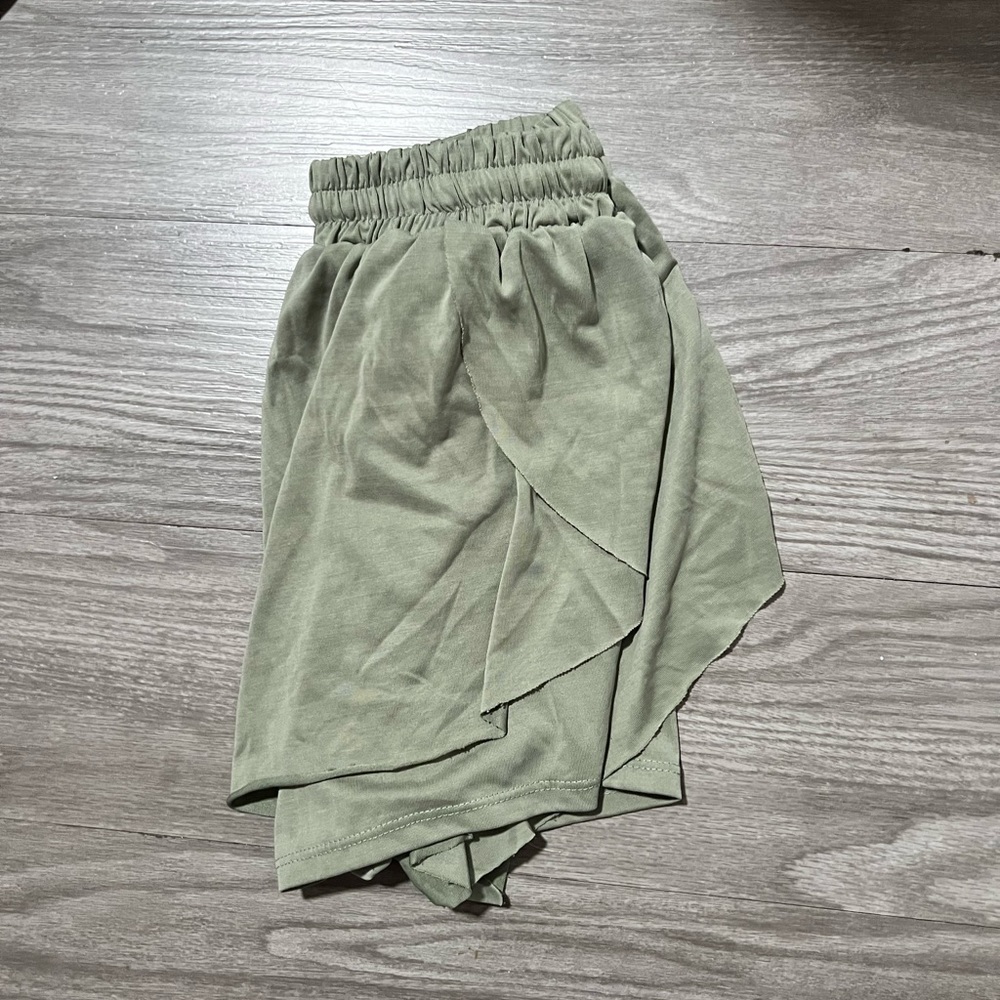 green flowy shorts